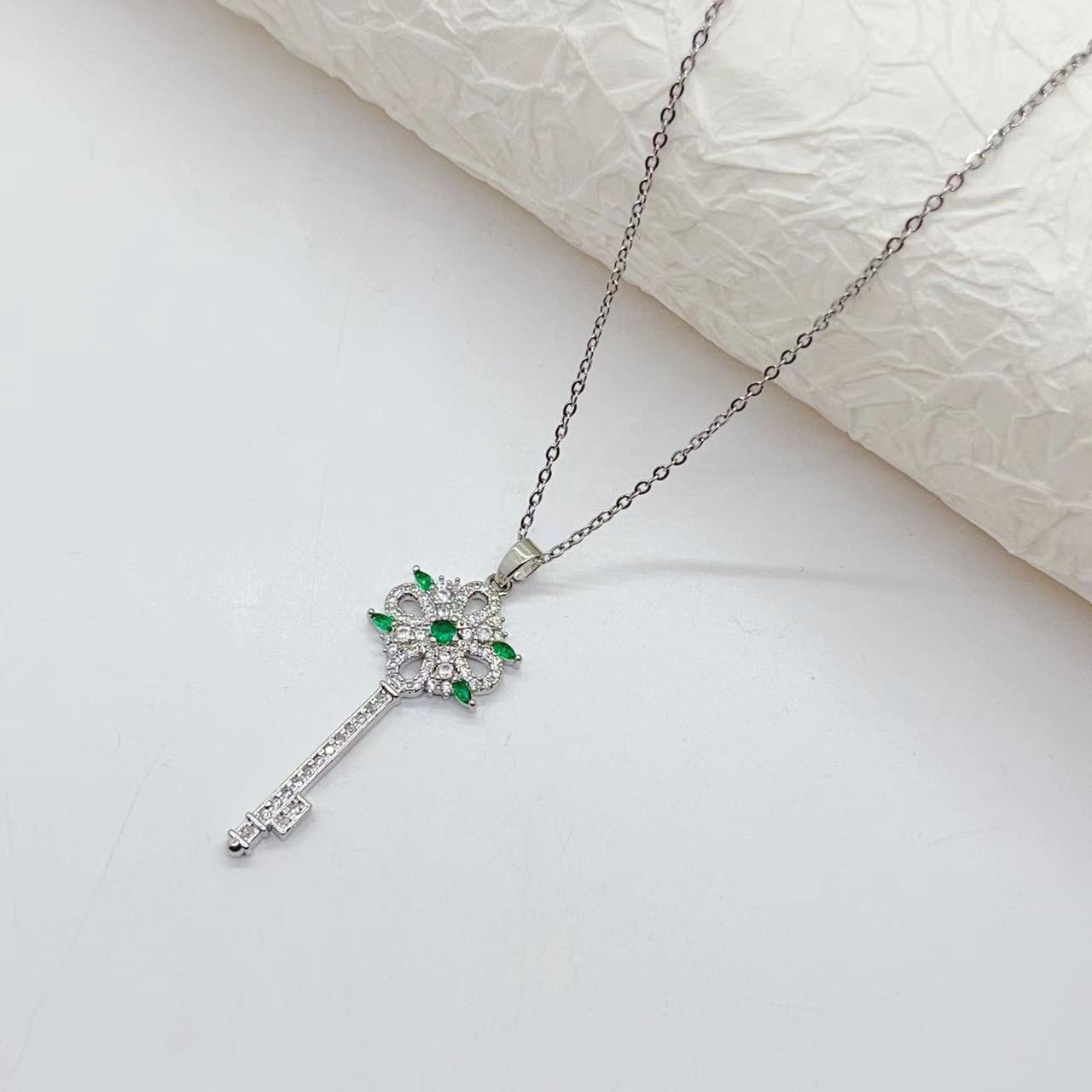 Golden Key to Elegance: Copper-Plated Zircon Pendant Necklace - Brillare Bijou