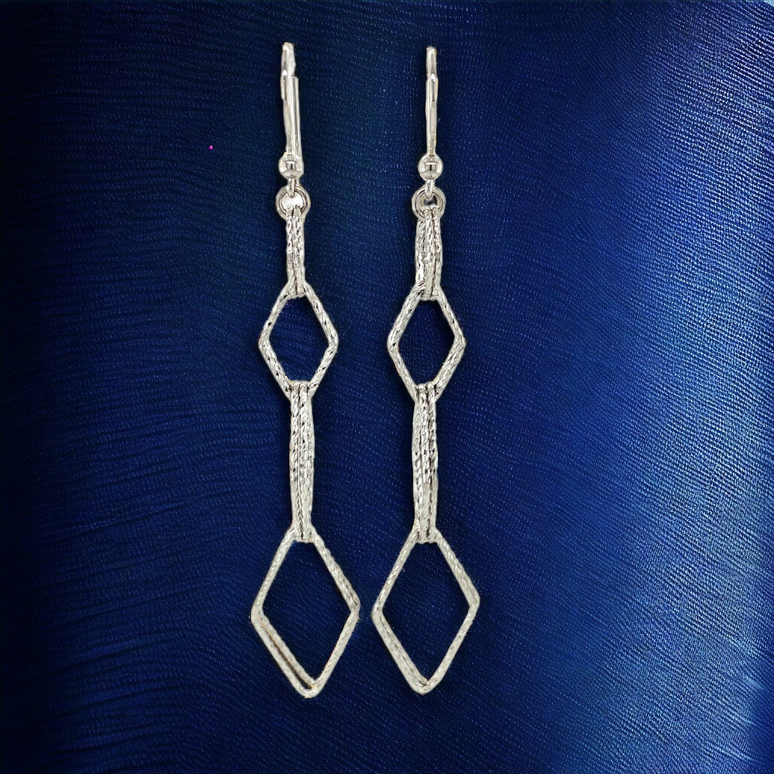 Add A Stylish Touch To Any Outfit With The Textured Interlocking Diamond Motif 925 Sterling Silver Earrings, Look Trendy And Unique. - Brillare Bijou