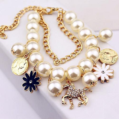 Pearl Blossom Bracelet – Timeless Elegance with Floral Charm - Brillare Bijou