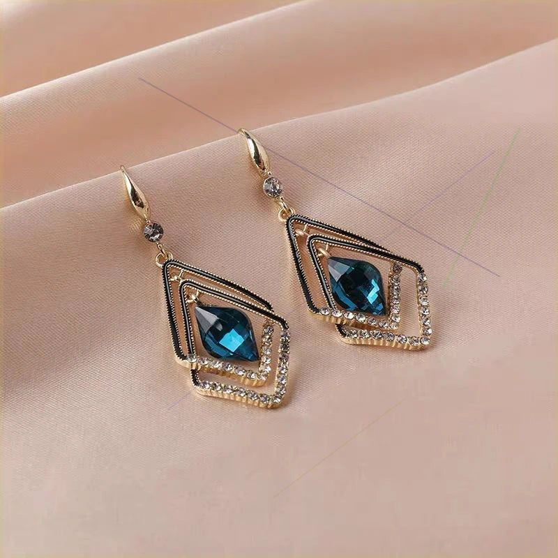Radiant Chain Drop Earrings – Gold Rainbow Zircon Elegance for Weddings & Glam Nights - Brillare Bijou